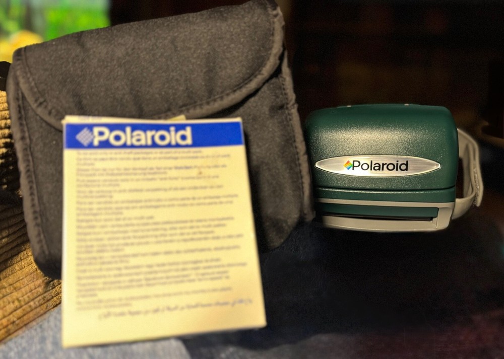 Polaroid One Step Express Camera with case and film
