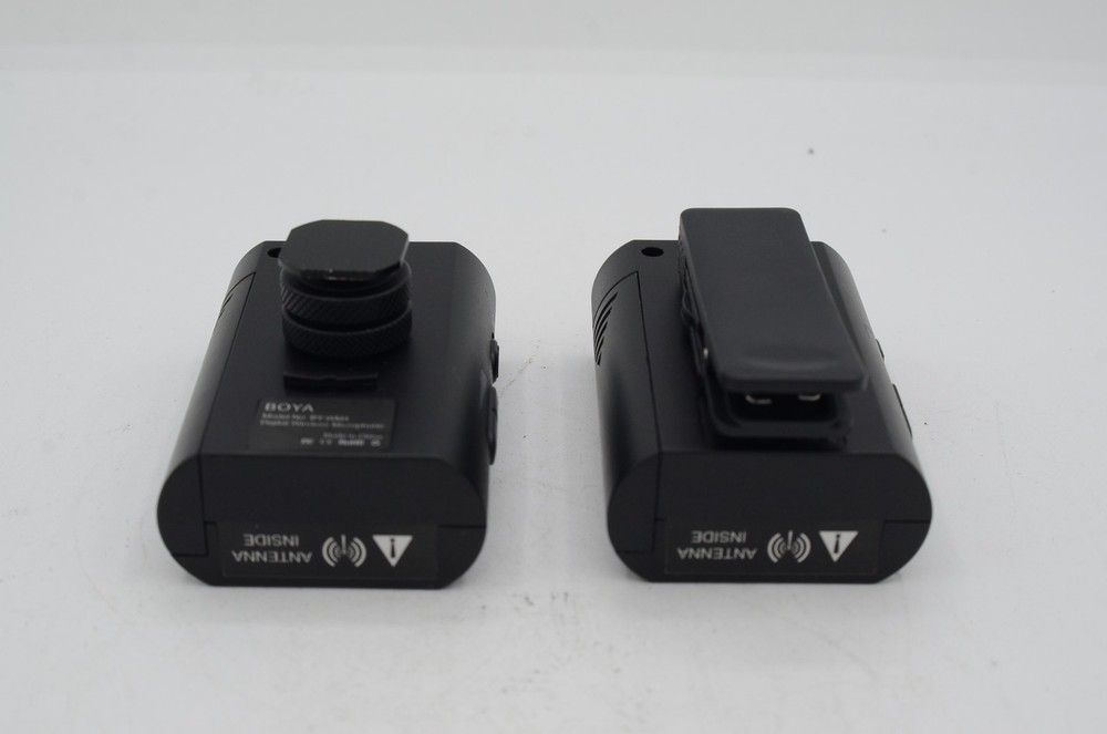 s BOYA BY-WM4 transmitter,receiver, lapel mic, and 2x 3.5mm cords