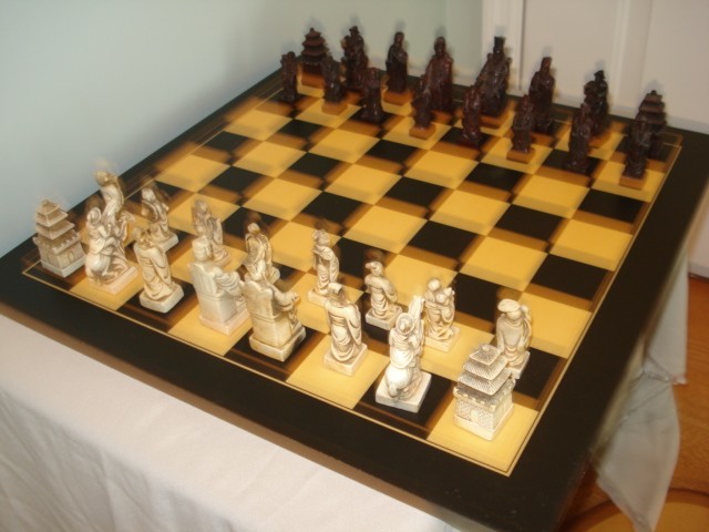 HAND CARVED BONE CHESS SET ASIAN THEME