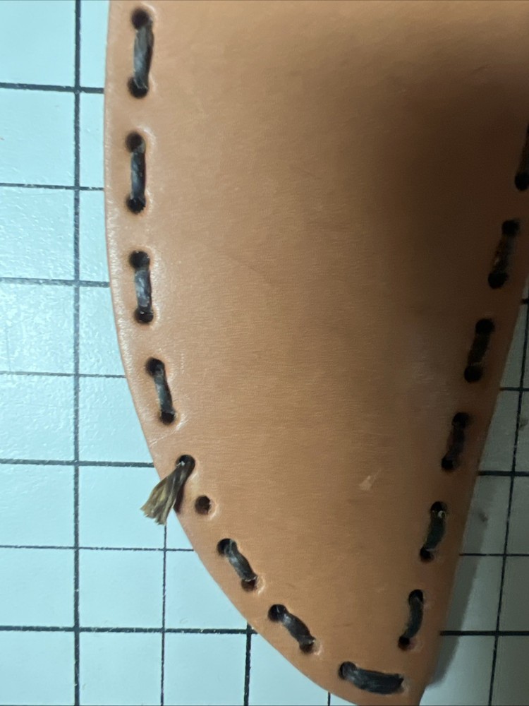 Two Unbranded Leather Sheaths