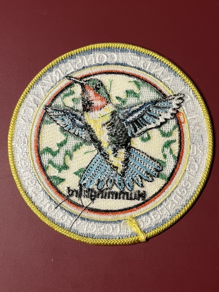 2004 WILDLANDS CONSERVANCY PATCH 4" DIAMETER "HUMMINGBIRD"