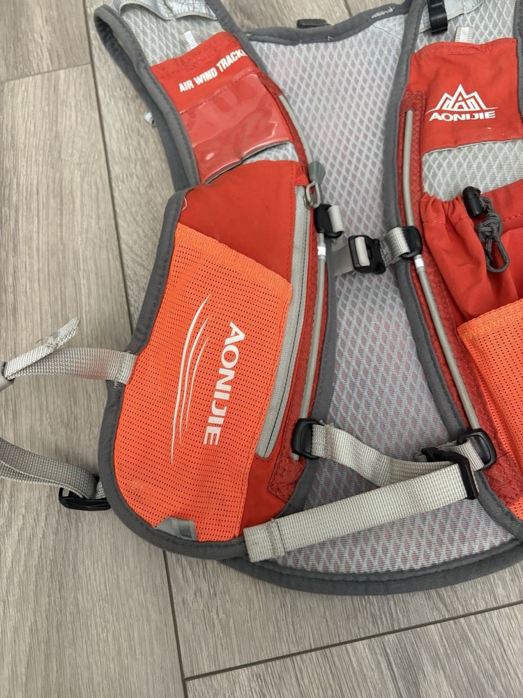 AONIJIE Hydration Vest Pack Backpack 5L Marathoner Running Race Hydration Orange