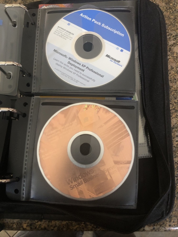 Microsoft Action Pack-Asst. Software 48 CDs- Many Keys Included