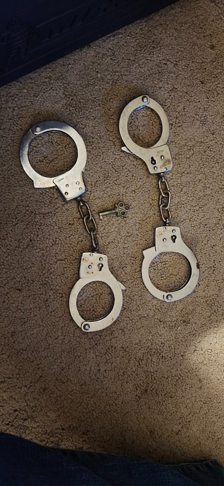 Handcuffs 2 sets with one working key
