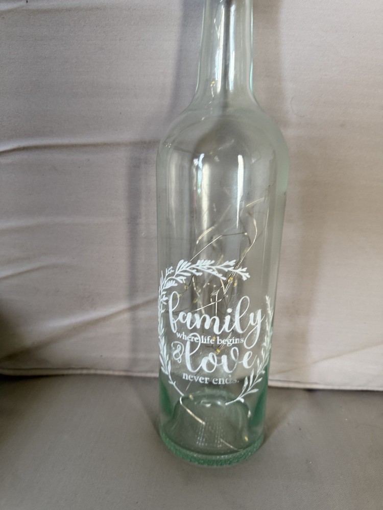 Lighted wine bottle with on/off switch in cork.