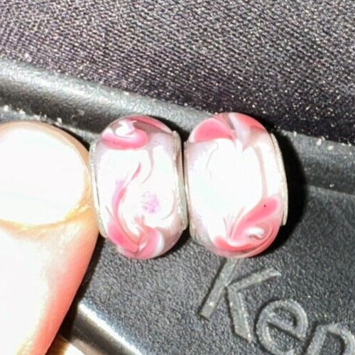 two matching pink patterned charms For Charm Braeclets
