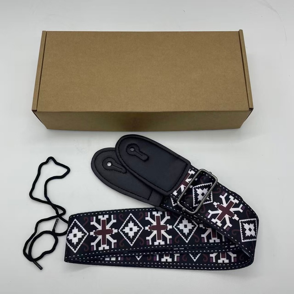 Black checkered pattern guitar strap, highly functional, currently on sale