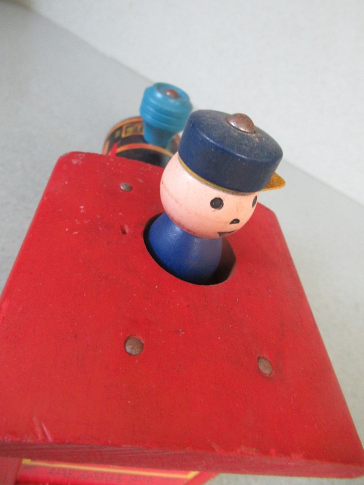 Wooden Chuggy Pop-up train engine pull toy