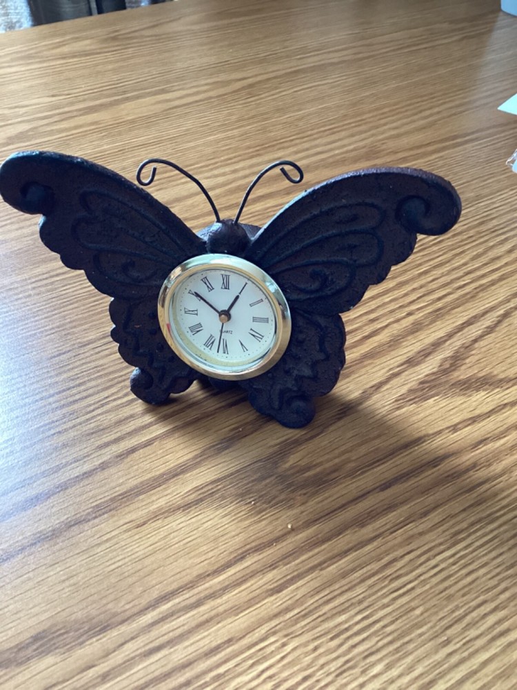 Butterfly shape collectible in good condition. Clock on this piece does not work