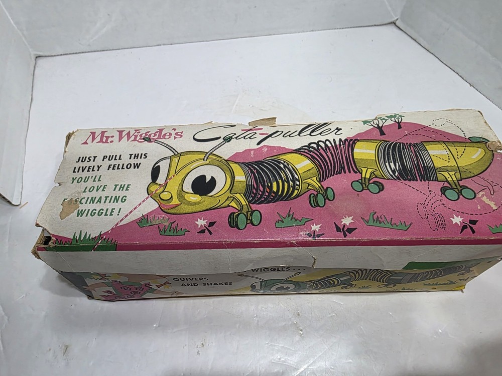 MR. WIGGLES CALA-PULLER SLINKY PULL TOY BOXED BY WILKENING SHARP