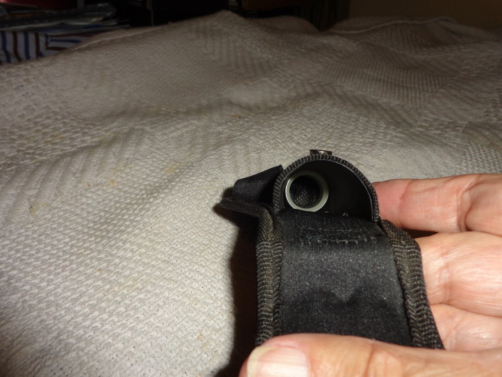 black synthetic flash light holder, snap shut holder only not the flash light