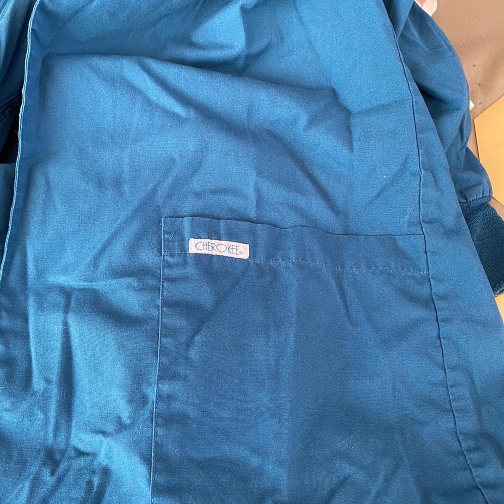 Woman's Teal color scrub Jacket Size S