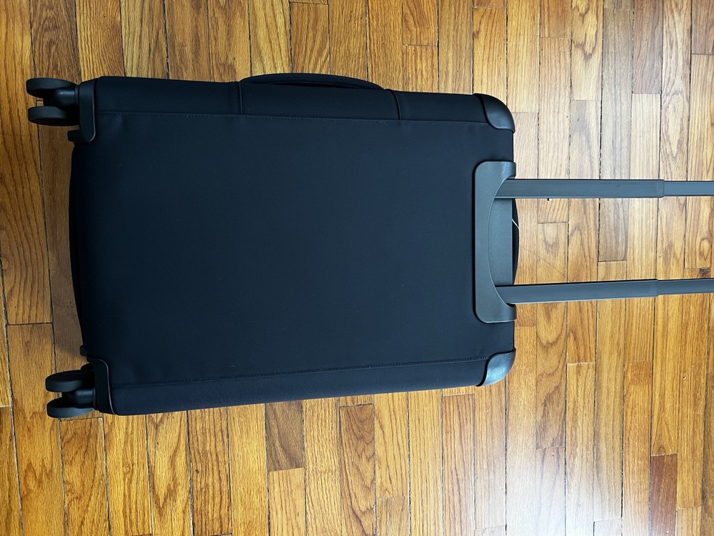 Away Softside flex carry on Expendable Luggage Black