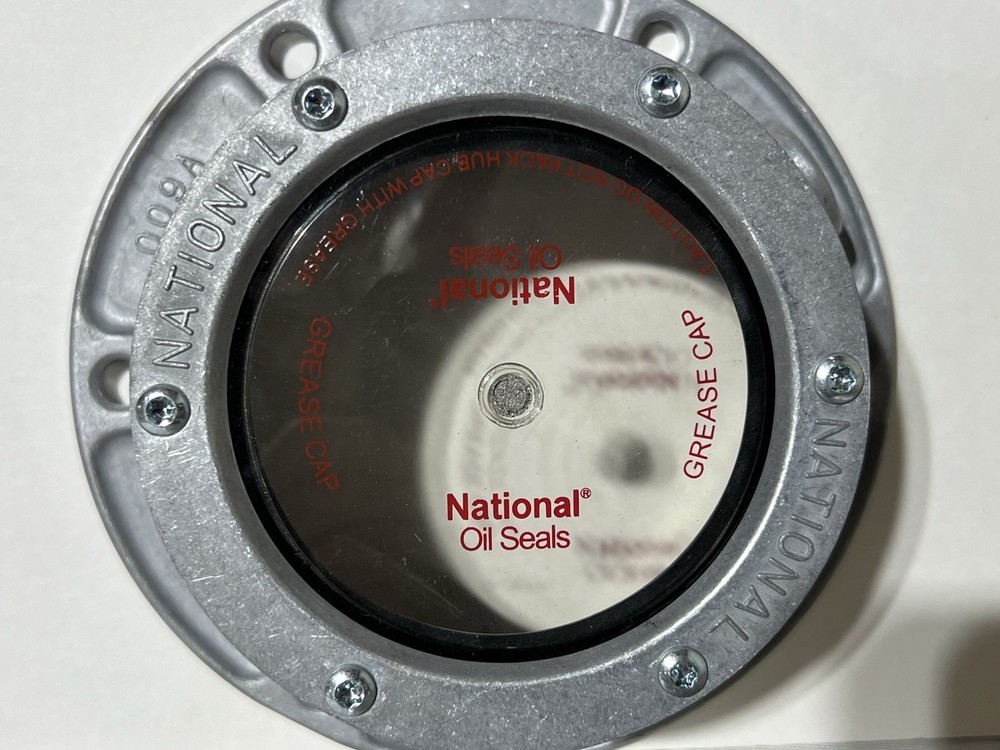 National Axle hubcap #009A-Grease Pack Style