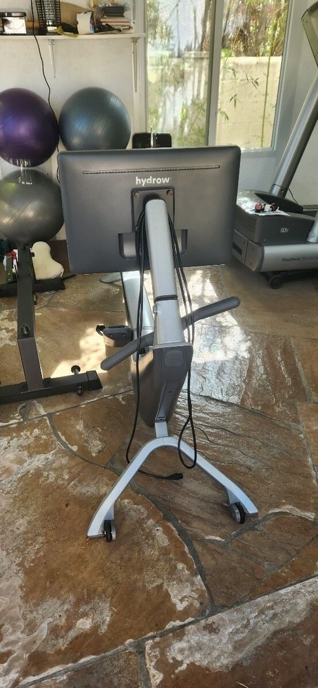 Hydrow Pro Rowing Machine with Immersive 22" HD Rotating Screen -Slightly used