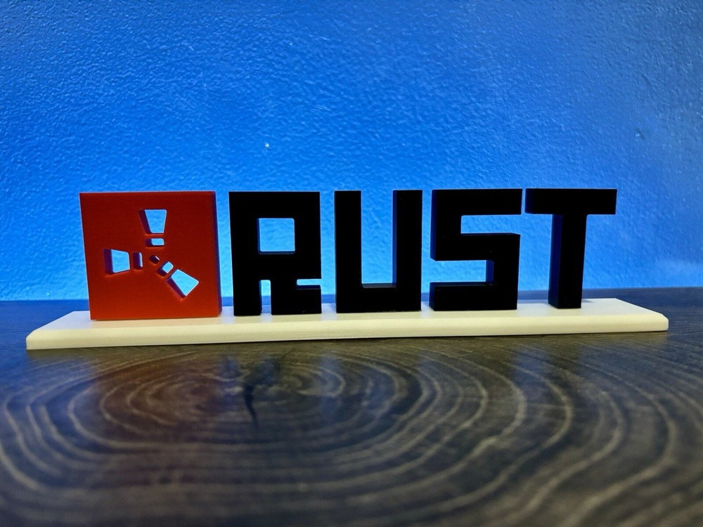 Rust Video Game Stand-Up Sign with Rust Logo, Text, and Base | Rust Prop