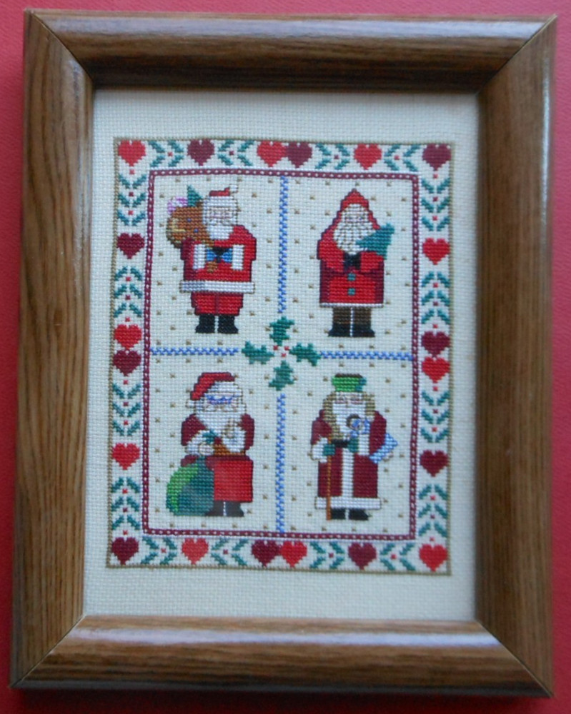 Four Santas Finished Cross Stitch Framed Christmas