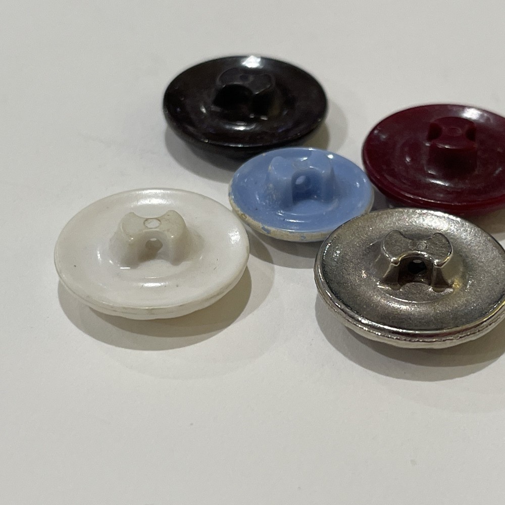 5 Vintage Plastic Colt Mfg Buttons #9