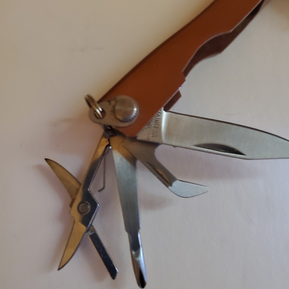 8 Function Scout Tool includes LED Light By Eddie Bauer Copper