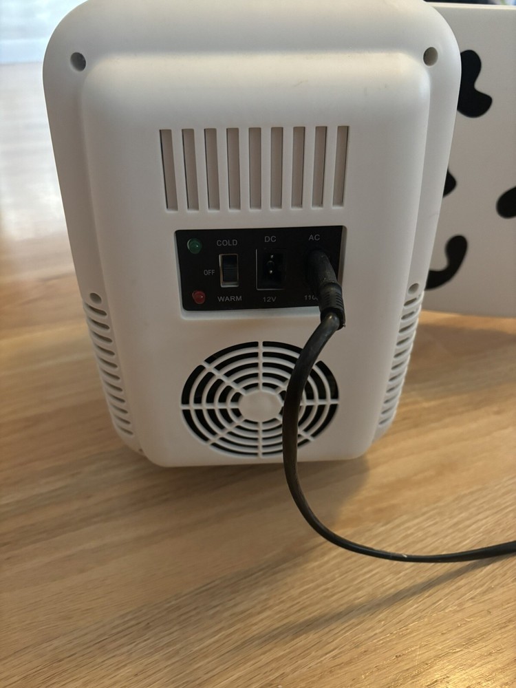 Hardly Used Cow Print 6 Can Mini Fridge