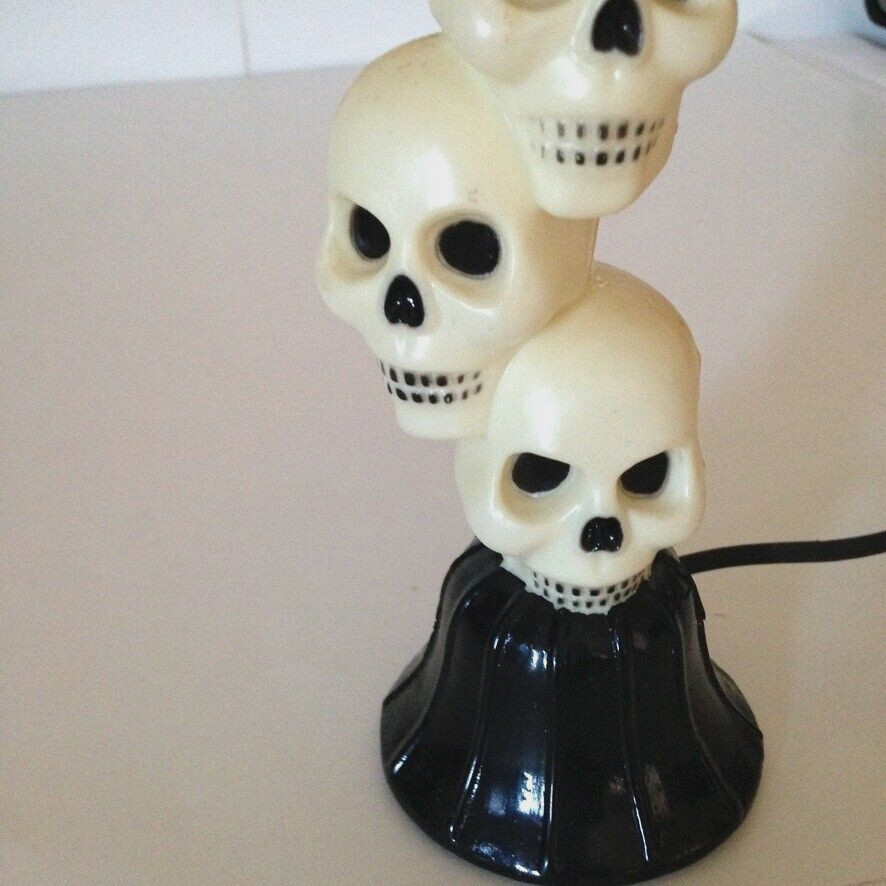Vtg. Plastic Flickering Lighted Stacked Skeleton Skulls Window Decor 9"