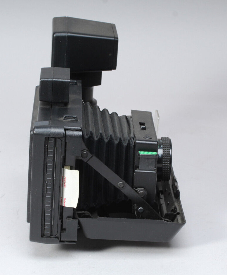 POLAROID PRO-PACK IN THE BOX W CAMERA FLASH STRAP & MANUALS FLASH BAD