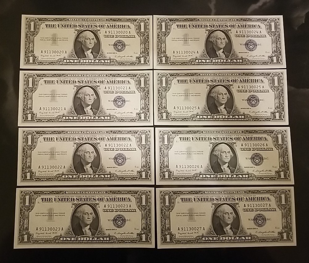 EIGHT $1 1957 A - CONSECUTIVE SERIAL #'S UNCIRCULATED SILVER CERTIFICATE NOTES.