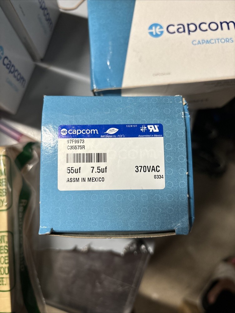 capcom capacitors 55uf 7.5uf 97F9973