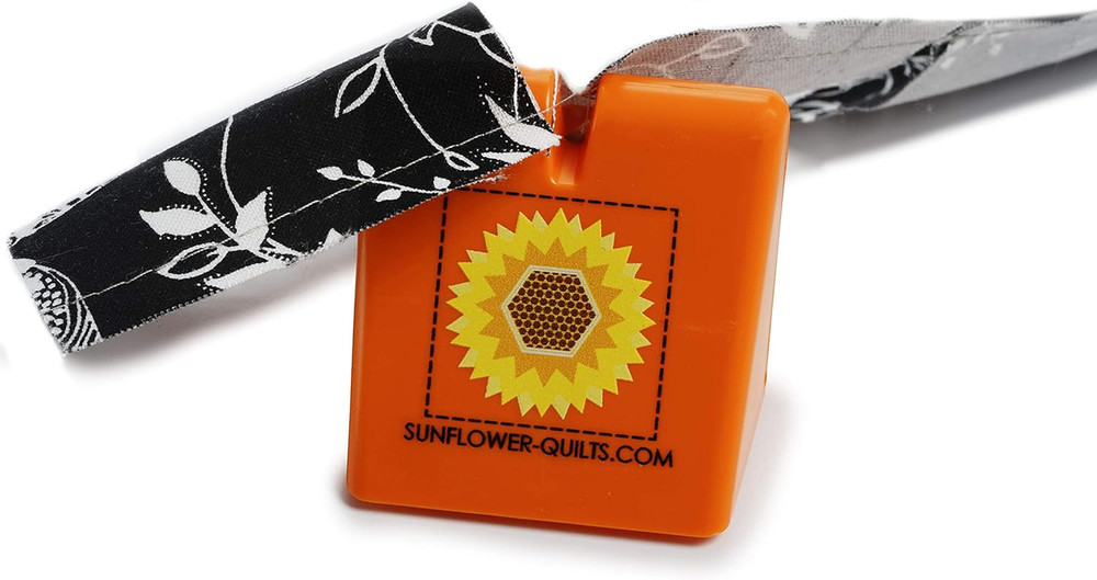 The Original Thread Cutter by (Orange)