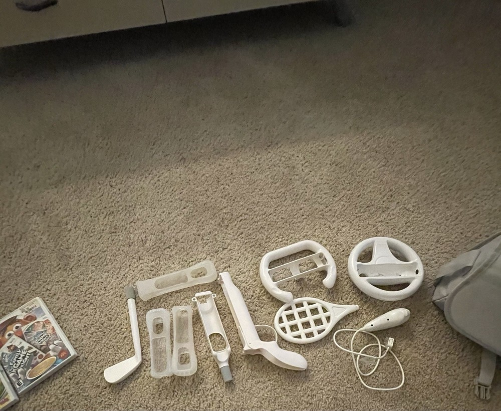 Nintendo Wii Bundle with Controllers, Games, Adapter, and Controller Cases