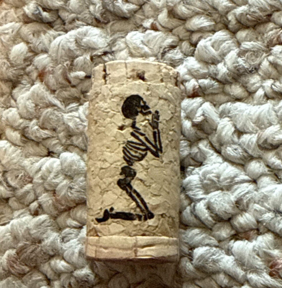 Sinners and Saints Used Wine Cork - Praying Skeleton