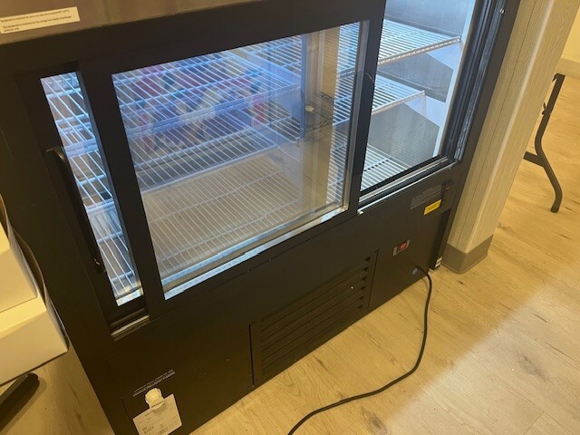Fogel Mirage 48" refrigerated curved front display case with 3 level display