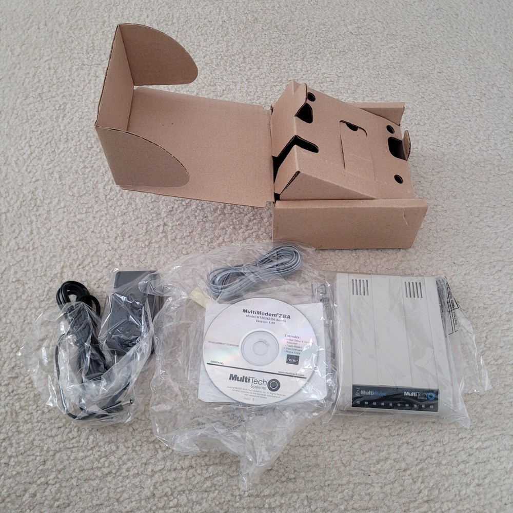 Multitech Systems Multi Modem Model: MT5634ZBA 56Kbps Data/Fax with accessories.