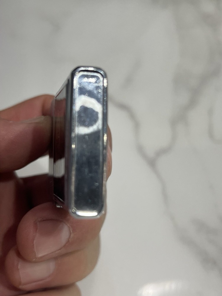 vintage “lowrey” silver matchbox holder