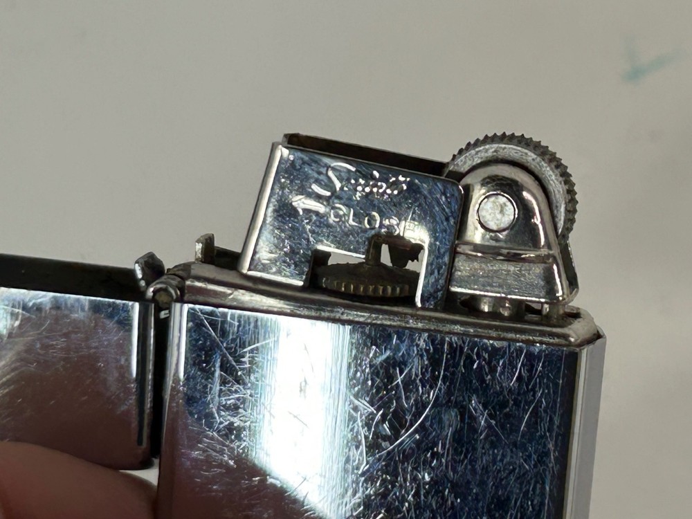 Vintage USS Frontier AD-25 Lighter