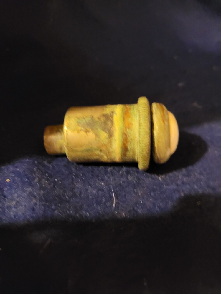 Antique cold water actuator for hotel sink.