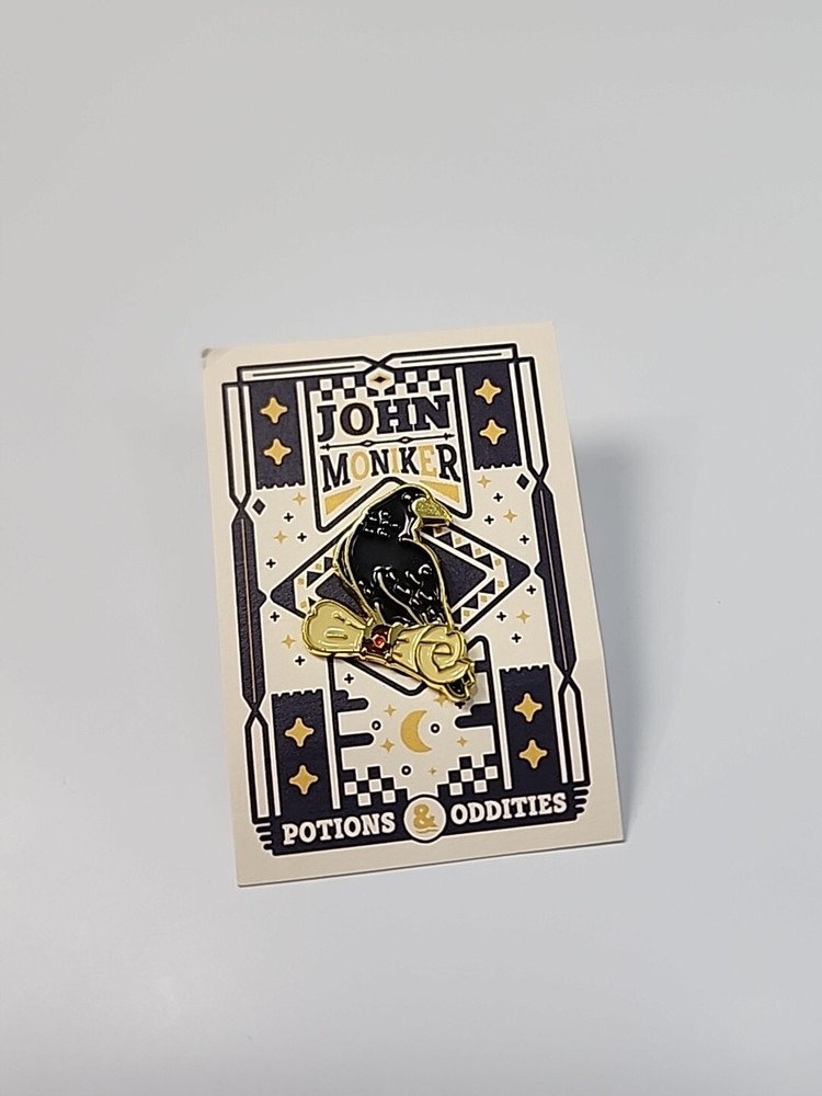 Black Bird with a Scroll Lapel Pin