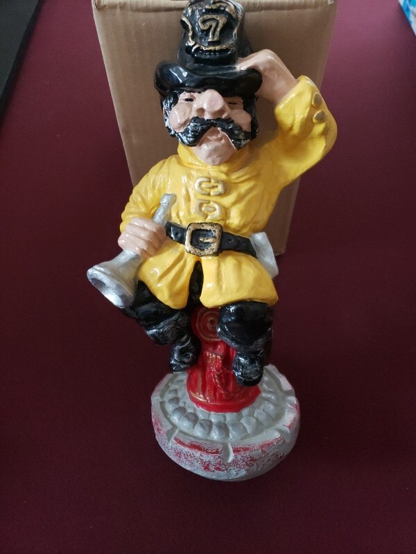 Vintage Fireman Chief #7 sitting on fire hydrant 12" chalkware.