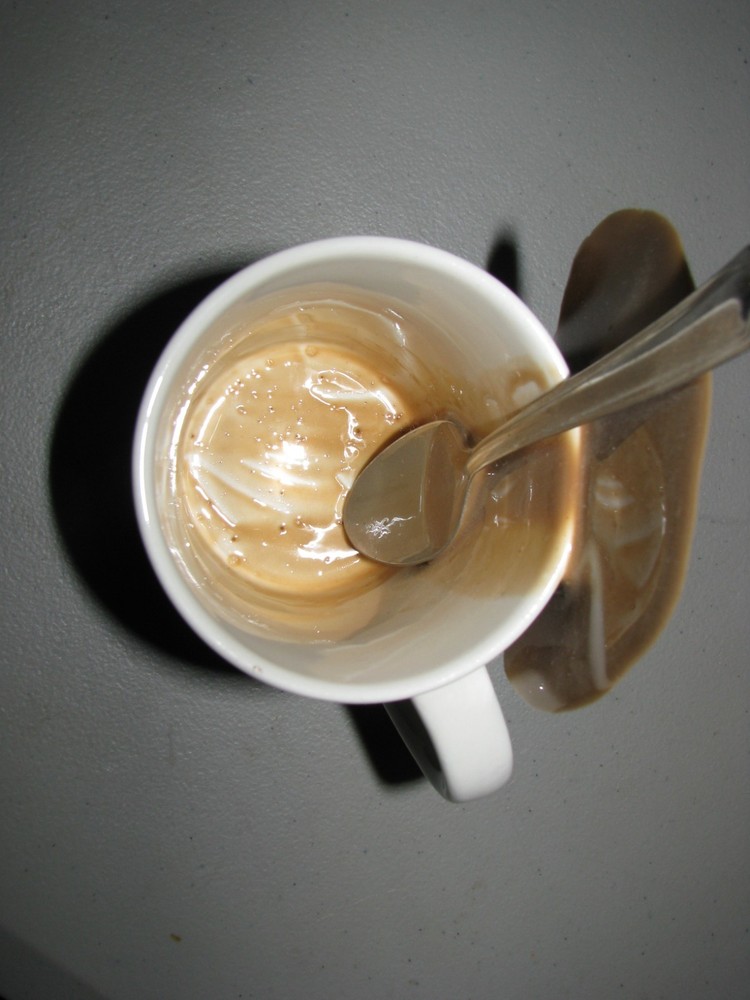 Fake Spilled Coffee Mug Display with Spoon