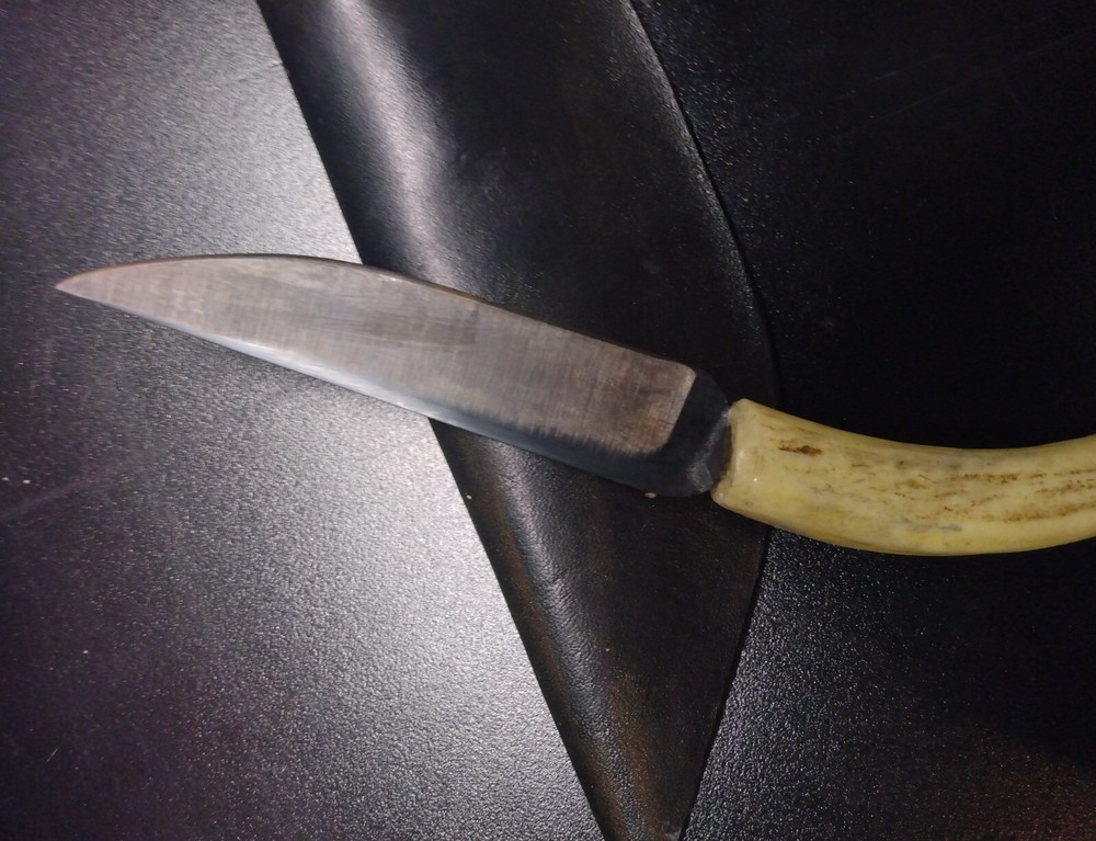 Unique handmade 8" knife in leather sheath