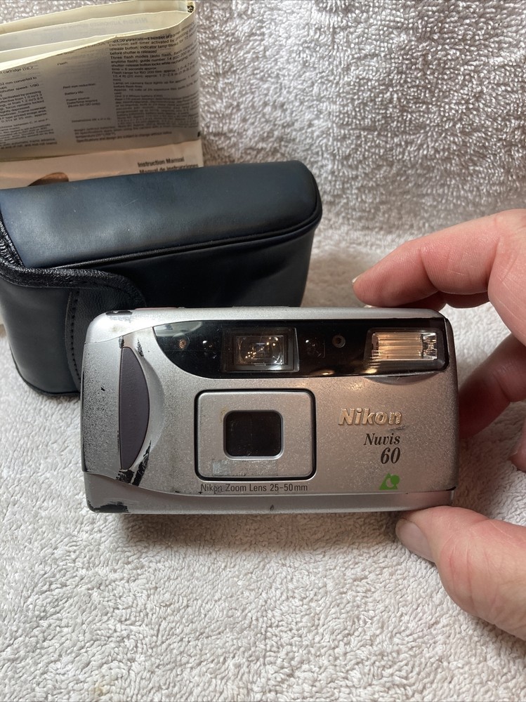 Nikon Nuvis 60 point & shoot compact camera preowned ￼ read Description.