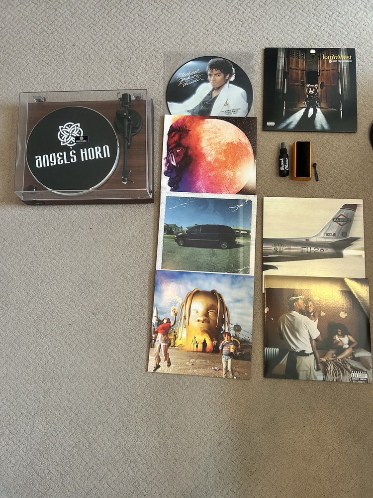 Record Player + 7 Vinyl Records + Cleaning Kit. See Description