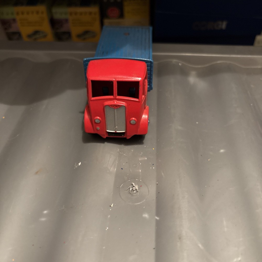 DINKY GUY FLATBED 1950s.red & light blue .