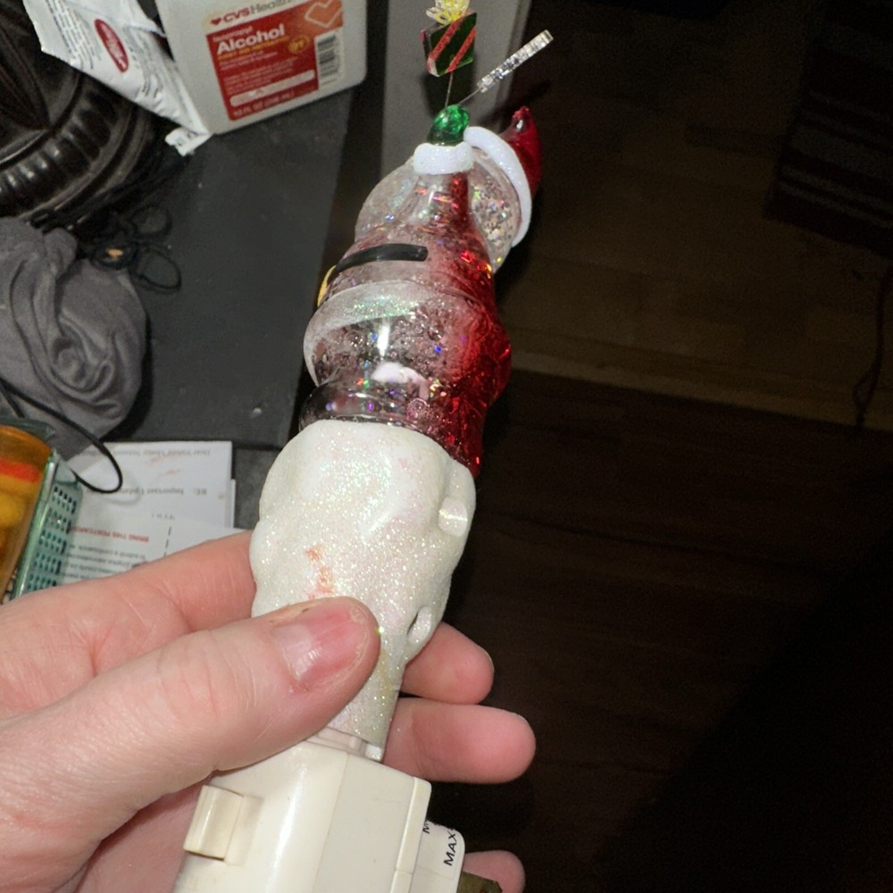 Santa night light with Jingles over his head