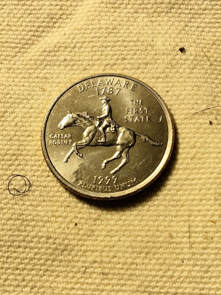 1999 D State Quarter Misaligned Die Struck Thru Grease