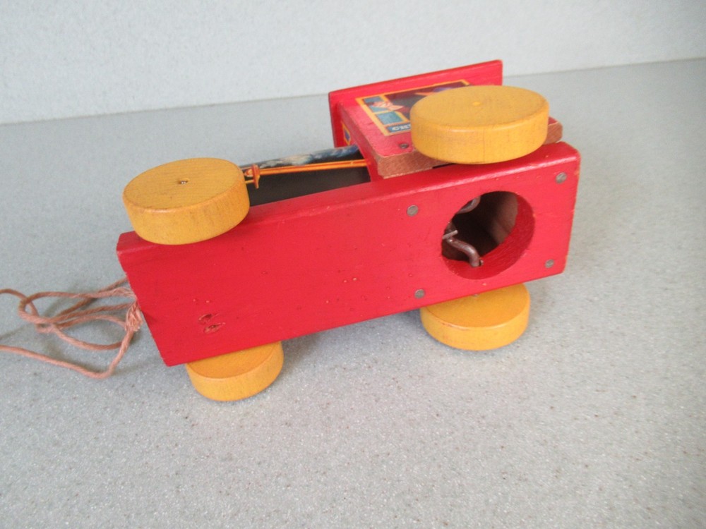 Wooden Chuggy Pop-up train engine pull toy