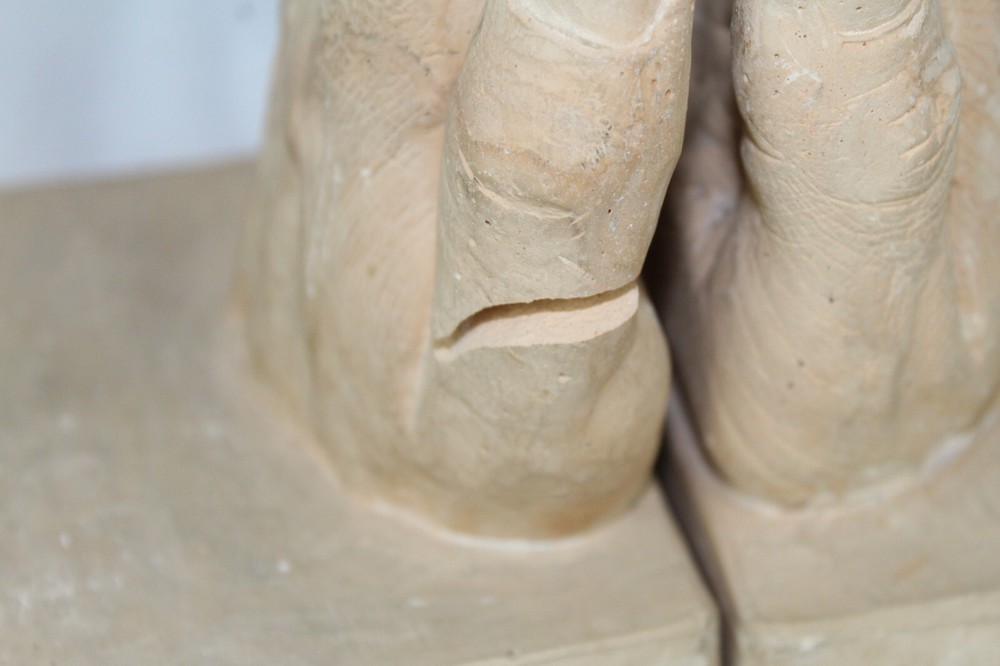 Plaster bookends Reading Hands