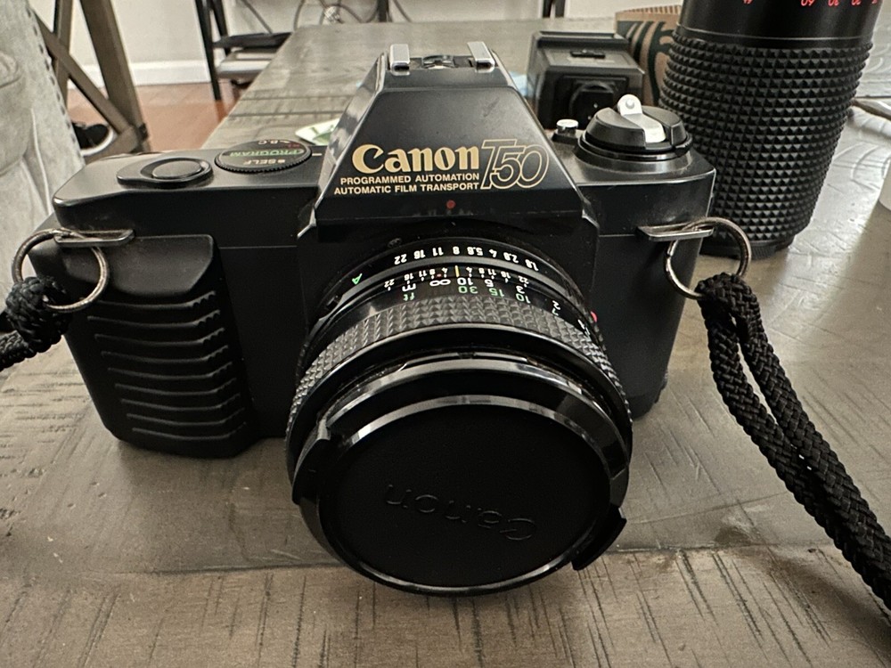 Canon T50 Black w/ Extra Lense Electronic Flash &Case