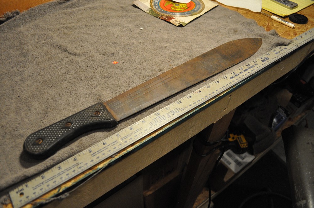 17 Inch  Machete with unusual hard plastic Handle, pointed tip , used see pics