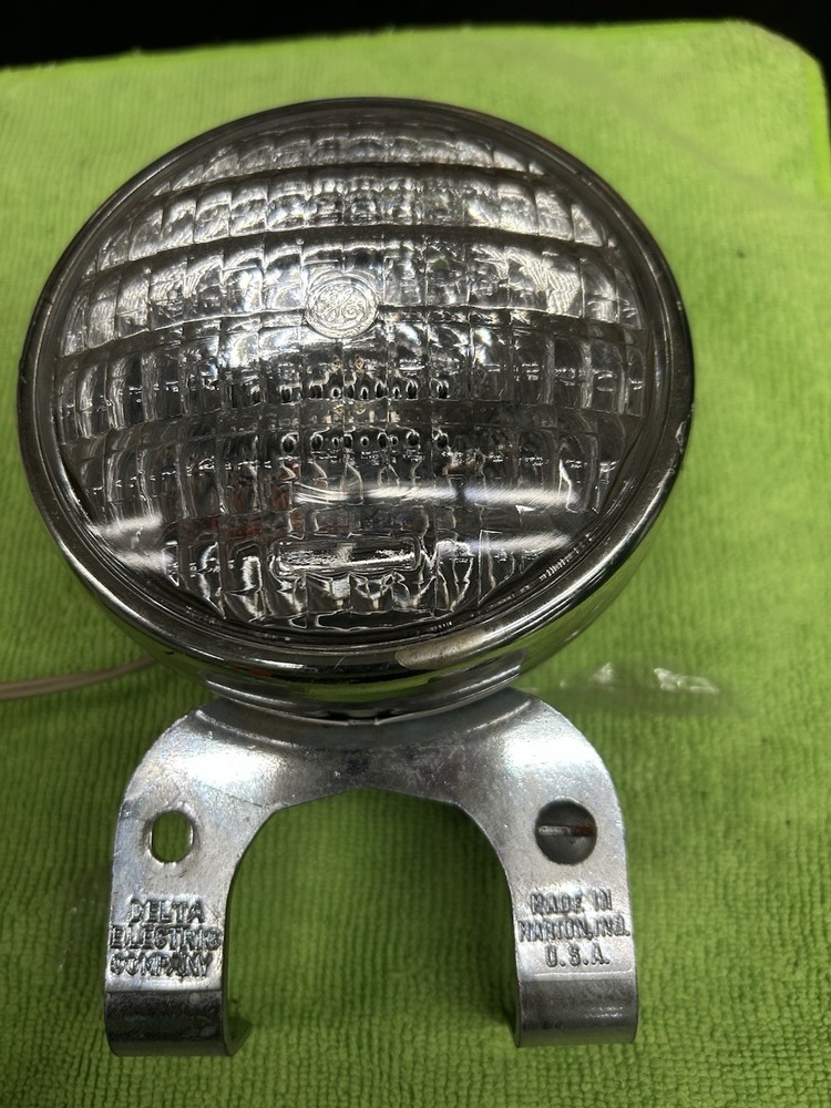 VINTAGE DELTA SEALED BEAM HEAD LIGHT AND HALF BATTERY BOX